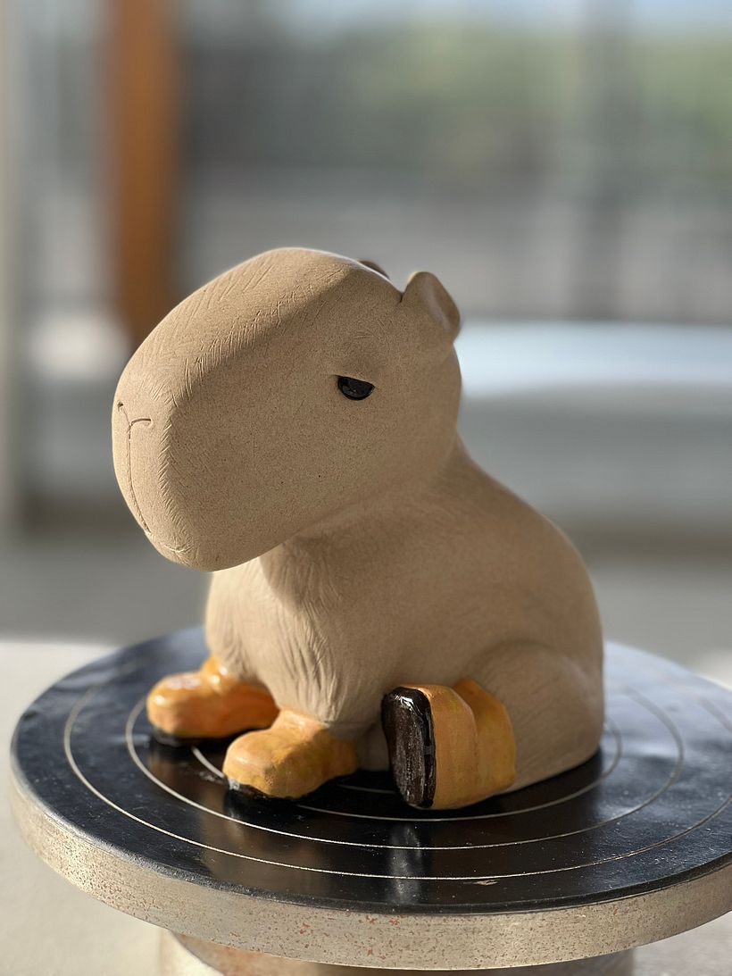 Design de Personagem - Capivara com botas amarelas 1