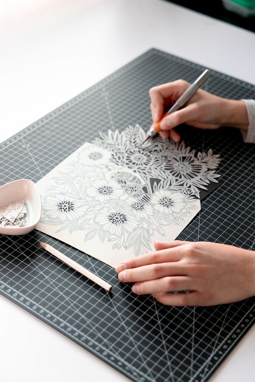 Bird Among the Flowers: A Detailed Papercut Illustration 2