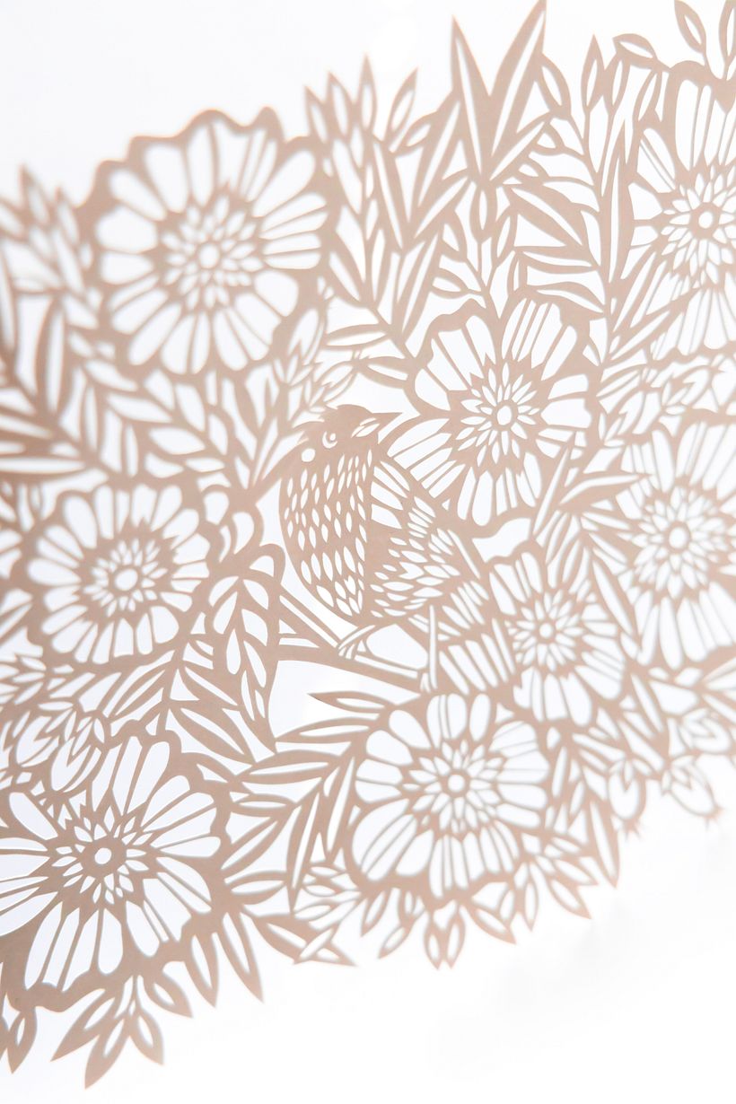 Bird Among the Flowers: A Detailed Papercut Illustration 2