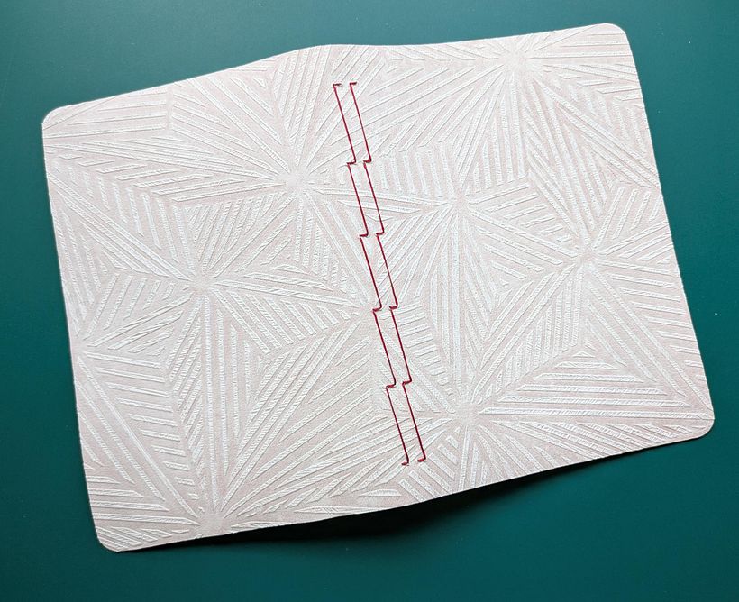 cuadernos cosidos con la costura expuesta de doble rayo 8